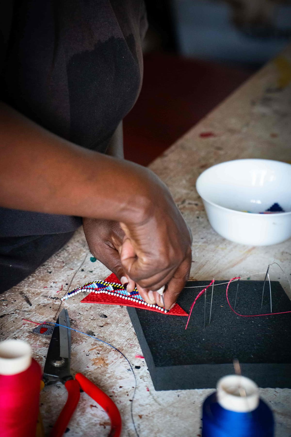 Artisan crafting leather product